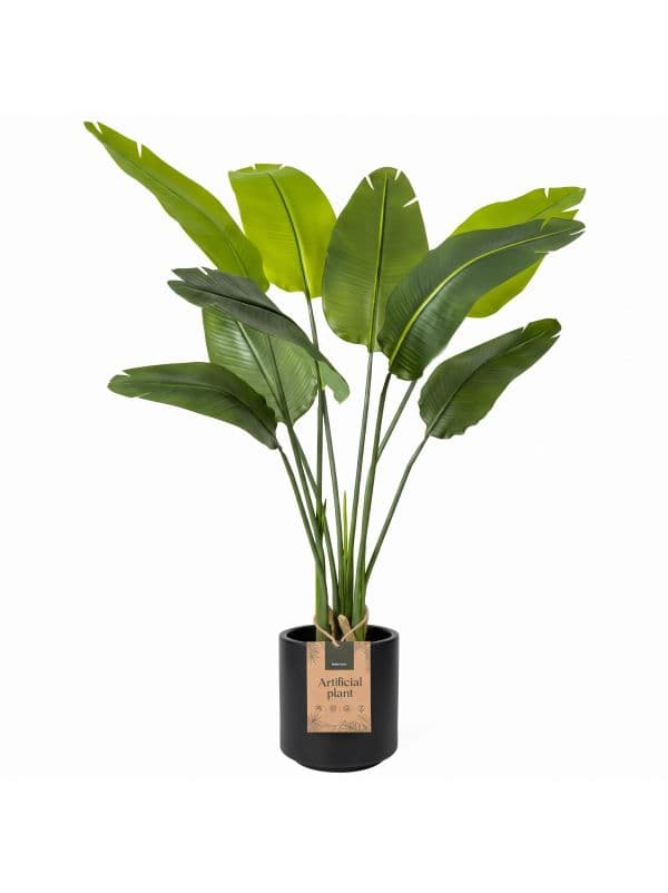 130 cm FairyTrees artificial strelitzia with wide, elongated leaves against a light background.