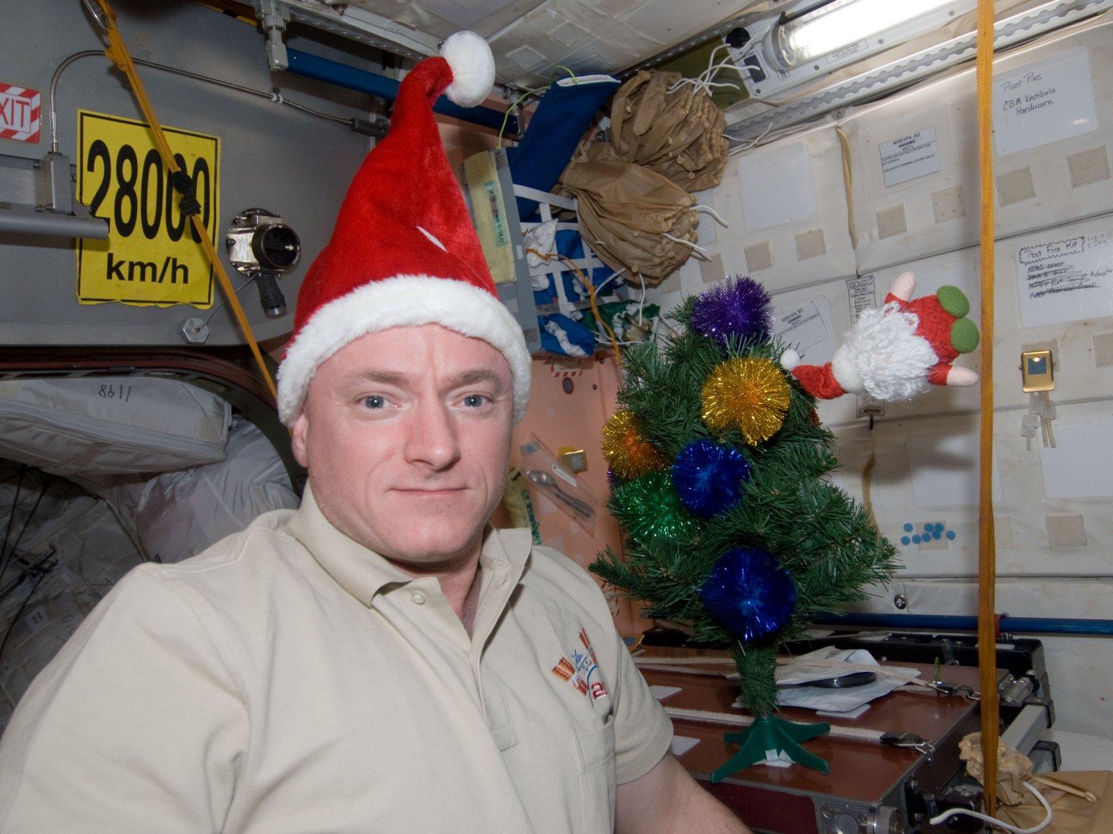 Astronaut Scott Kelly wearing a holiday hat aboard the International Space Station, December 2010.