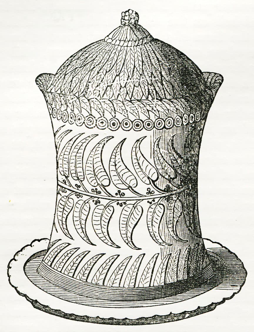 Nineteenth-century engraving depicting Yorkshire Christmas Pie, a monumental meat pie baked in pastry with layered meats, served as a showpiece Christmas dish.